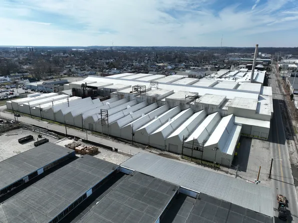 aerial drone shot of a mega warehouse in indiana with a new roof