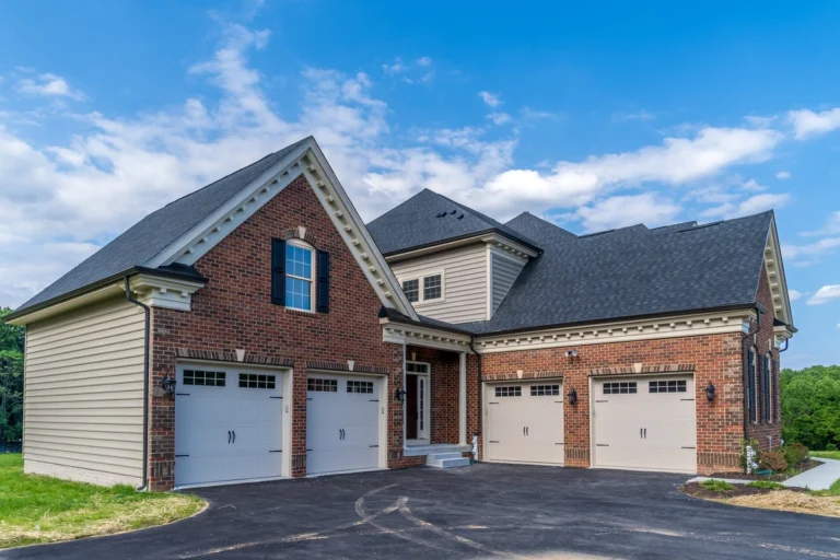 roof layers-brick home with dark gray shingles