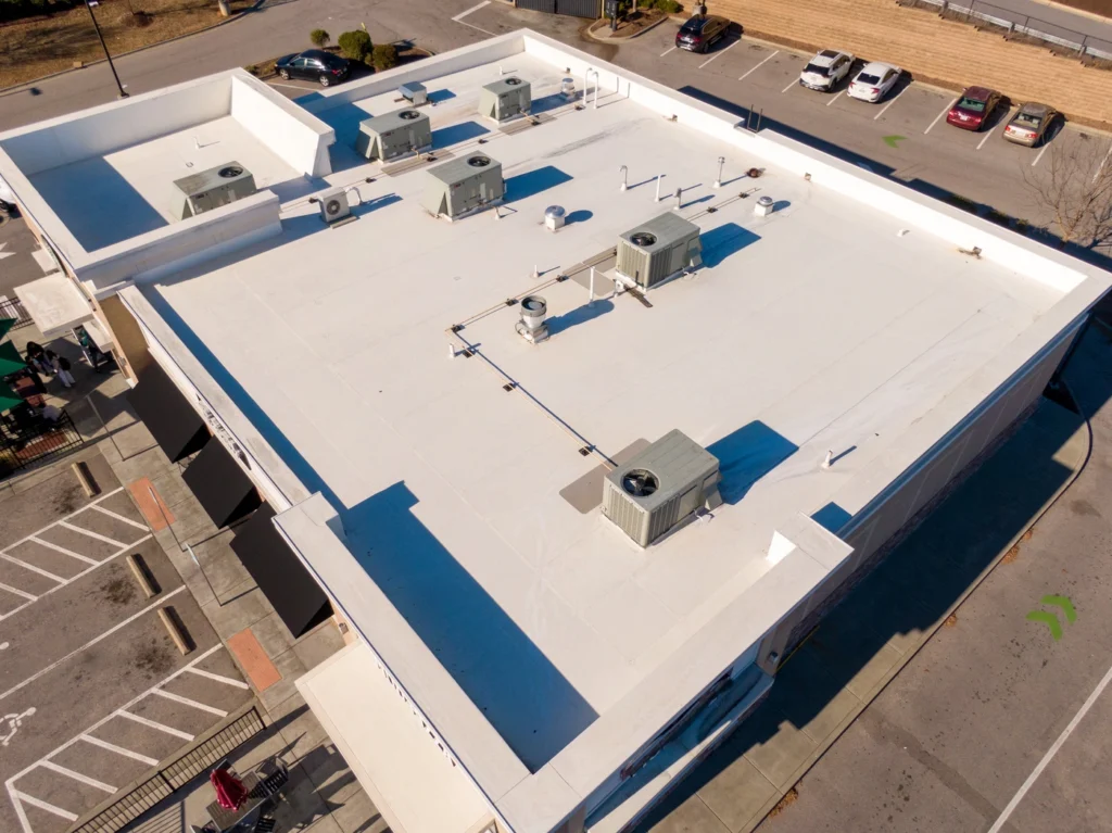 aerial view of flat tpo roof repair job due to roof leaking