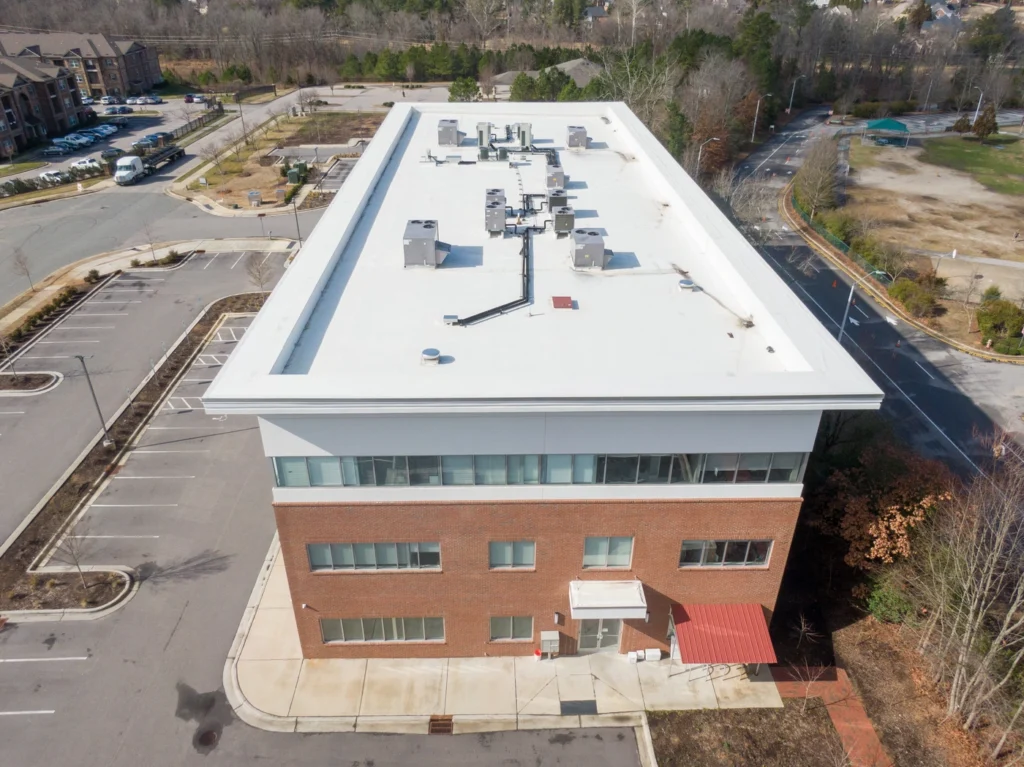 drone photo of new build with tpo roofing system installed