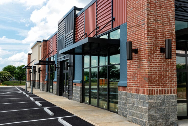 roof overhang-commercial building with awnings over doors