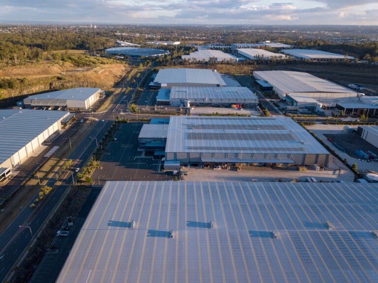 Commercial roofs on three different building lined up