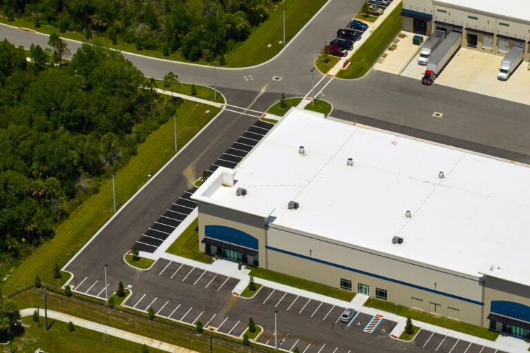 Aerial view of industrial park with goods warehouses and logistics centers