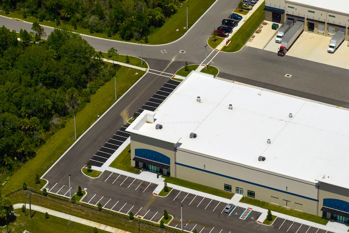 Aerial view of industrial park with goods warehouses and logistics centers