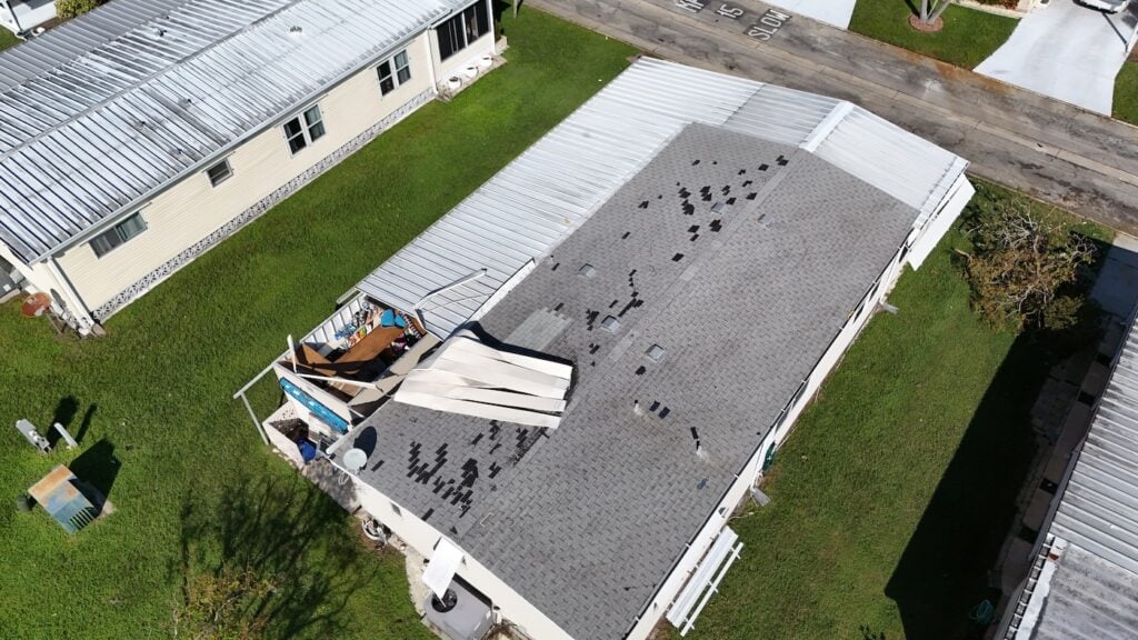aerial view of wind damaged roof