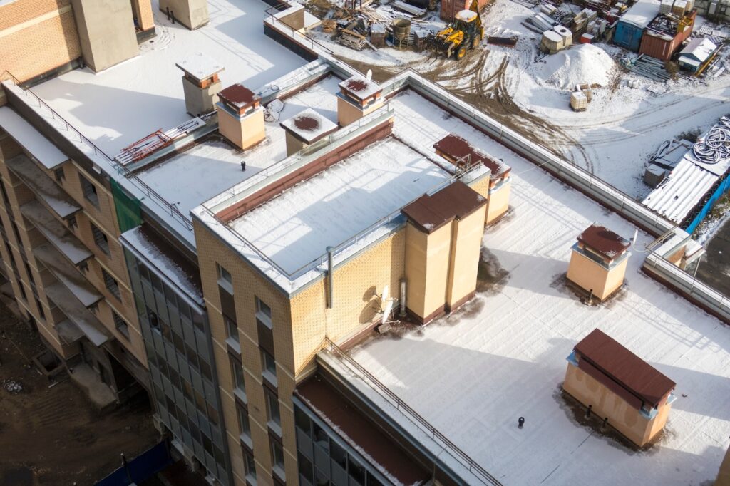 snow on the roof of the house