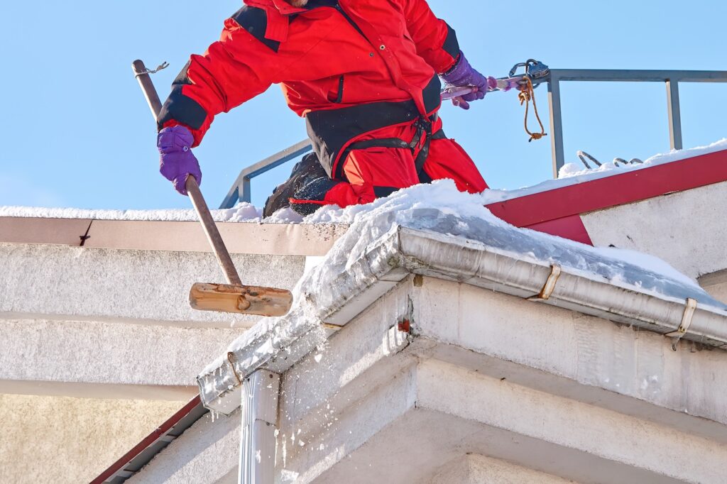 clearing ice from gutter