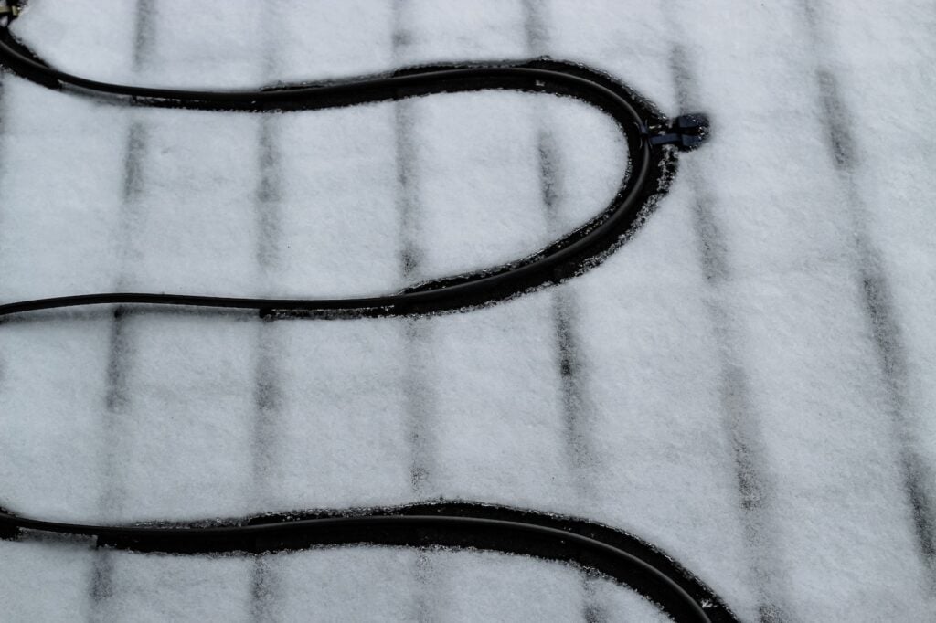 closeup of roofing cable on roof
