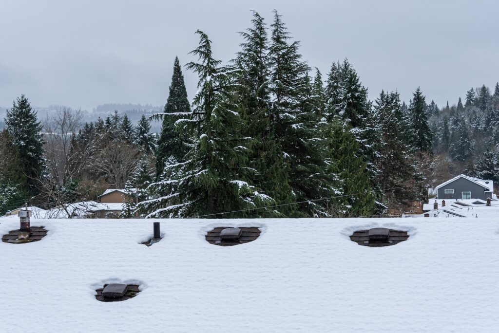 ventilation on snowy roof
