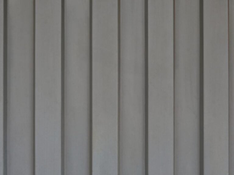 Gray Sheet Metal with Trapezoidal Structure Running in a Row